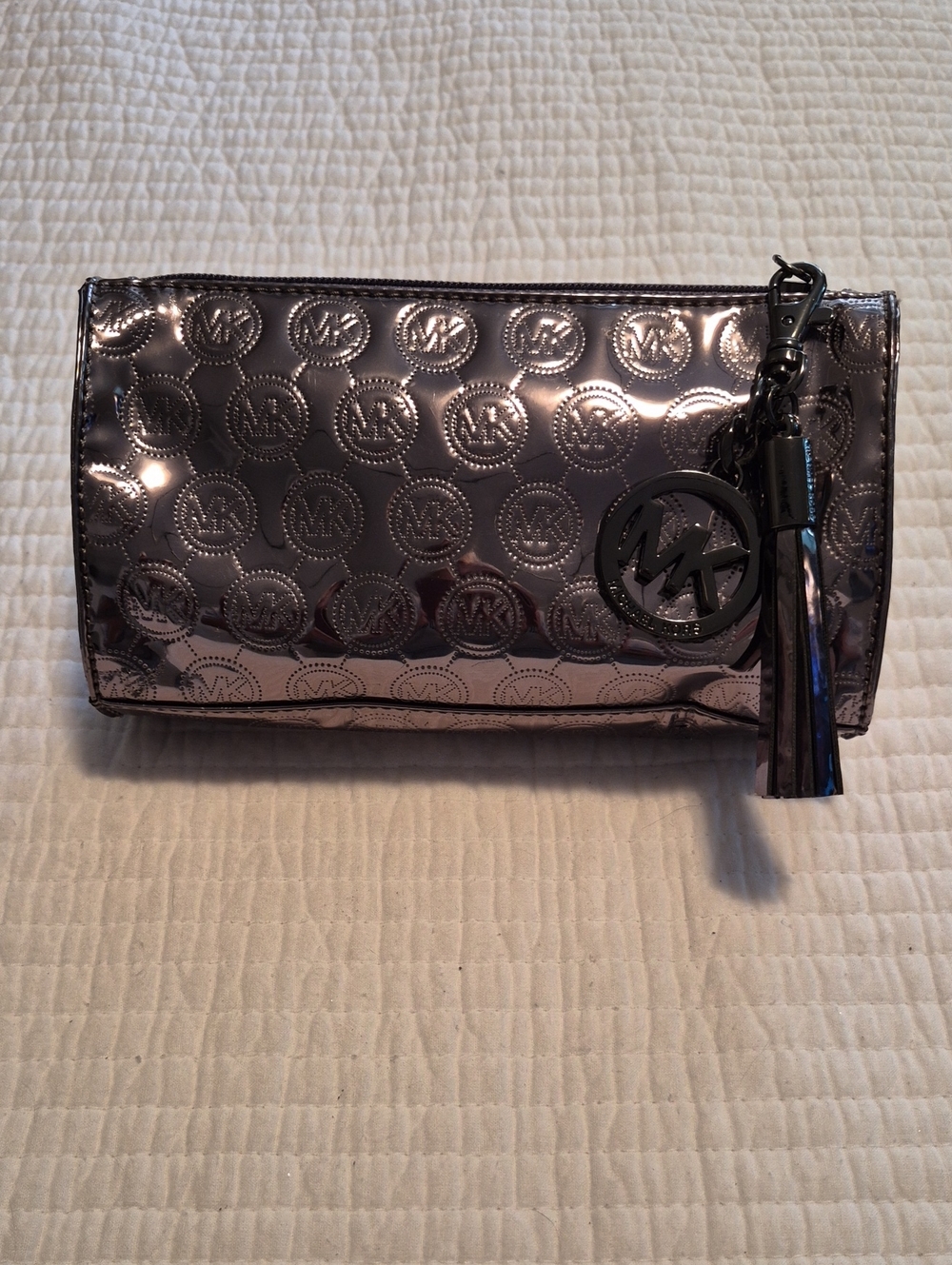 Michael Kors Metallic Pewter MK Logo Clutch with Tassel Charm Bag